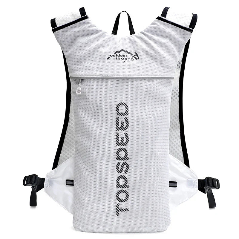 White TOADSPEED lightweight hydration backpack with mesh straps and black buckles, designed for outdoor activities