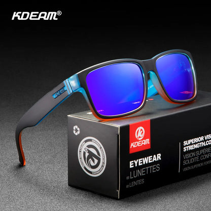 Sunglasses with blue lenses on a KDEAM branded box against a dark background